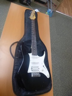 Ibanez Gio Bolt On Electric Guitar C/w Wings Guitar Bag *Note: Minor Dents And Scratches On Pick Up Guard And Body*