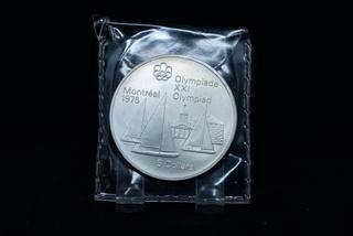 1976 Montreal Olympiad 5 Dollar Silver Coin.