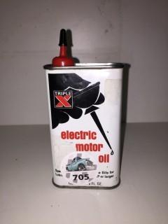 8oz Triple X Electric Motor Oil.