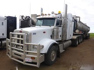 2015 PETERBILT 367 Tri Drive Highway Tractor, 291,594 Km, 8,575 Hrs, c/w Cummins ISX-15 (550 HP) c/w 18 Spd, 16,000 Lb Front, 61,000 Lb Rear Axles, A/R Susp, 266" Wheelbase, Differential & Inter-Axle Lockups, Wet Kit & Hyd Oil Cooler,  48" High Rise Sleeper, Cabinets, Walking Deck, Air Slide Fifth Wheel, 385/65R22.5 Front Tires, 11R24.5 Rear Tires, Sold with SV04.