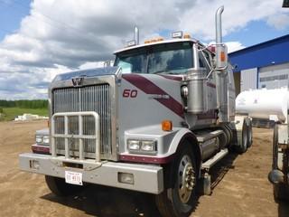 2006 Western Star 4900 FA T/A Highway Tractor, 284,253 Km, c/w Detroit 515 HP Engine, 18 Spd, 12,000 Lb Front, 46,000 Lb Rear Axles, Differential and Inter-Axle Lock-up, A/R Susp, Wet Kit, Flat Top Sleeper, 11R24.5 Tires.