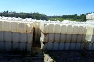 Lot of (Approx. 8) Poly Tanks.