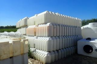 Lot of (Approx. 8) Poly Tanks.