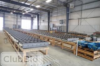 Lot of Asst. Concrete Block Molds and Wooden Tables. 
