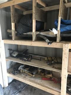 Contents of Seacan Shelving including Asst. Buck Teeth, High pressure Hose, Trailer Tire, Snow Fence, Booster Cables, Asst. Pumps,