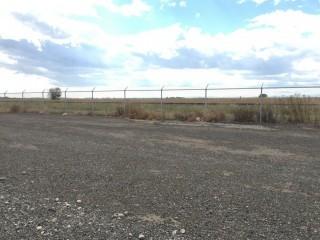 8' x 250' (approx.) Section of Chain Link Fence Includes Barbwire and Posts Within.