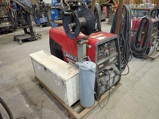 Skidded Lincoln Electric Ranger 305G Gas Welder w/ Cables, Rod Oven and Welders Blankets. Showing 4,409hrs.