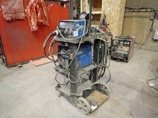 Miller XMT 350 CC/CV Autoline Mig Welder w/ Miller 24A Wire Feeder, Cart and Cables. 