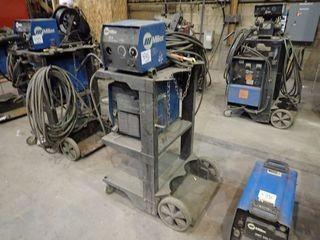 Miller XMT 350 CC/CV Autoline Mig Welder w/ Miller 22A Wire Feeder, Cart and Cables. 