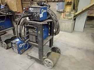 Miller XMT 350 CC/CV Autoline Mig Welder w/ Miller 22A Wire Feeder, Cart and Cables. 