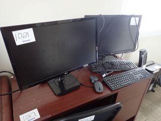 Lot of 2 LG 24" Flatscreen Monitors. **LOCATED IN MODULAR BUILDING, MAIN FLOOR**