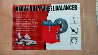 Unused Heavy Duty Wheel Balancer c/w 110V, 60 HZ. Control # 7031.