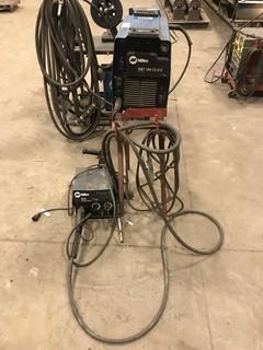 Miller XMT 350 w/ Miller 22A Wire Feeder, Stand, Hoses, Cords, Guns, etc. **LOCATED IN EDMONTON** 