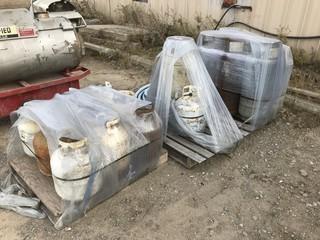 Lot of Approx. (10) 20lb. Propane Tanks and (4) Forklift Tanks **LOCATED IN EDMONTON** 