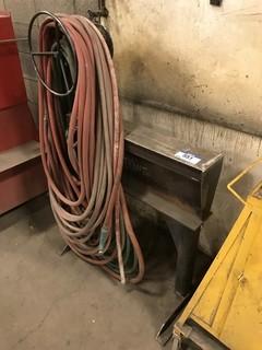 Steel Reel Stand w/ Asst. Garden Hose **LOCATED IN EDMONTON** 