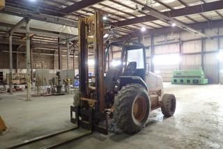 Case 588G Rough Terrain 8,000lbs Capacity Diesel Forklift. 2-Stage Mast, Side Shift, 19.5L-24 Front Tires, 33x6x11 Solid Rear Tires, Showing 13,058hrs. Serial JJG0294131. **BEING USED FOR LOADOUT, CANNOT BE REMOVED UNTIL MON NOV.19 AT 3PM, LOCATED IN INNISFAIL**