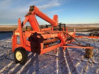 2007 Akron E180TH Grain Extractor. Orbital Motor Driven Bag Roll, Auger Light, Travel Beacon, Folding Unload Auger, Removable Extensions for Various Bag Sizes, Unload 9-12' Bags, Easy Transfer to Tow Mode for Road Transport. SN 80592077.
