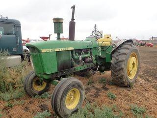 1962 John Deere 4010 Diesel Tractor. 10.00x16SL Front Tires and 18.4x34 Rear Tires, Interchangeable PTO 540/1000, 2 Hydraulic Banks, Master Battery Disconnect, Wheel Weights, Rebuilt Motor, New Batteries, Lights and Seat. Showing 706hrs. SN 401022T17429. **WORK ORDERS AVAILABLE**