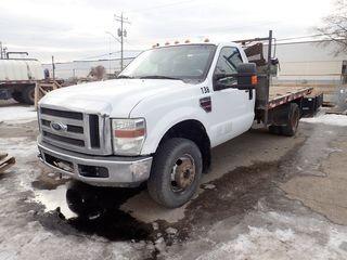 2008 Ford F350 Super Duty XLT DRW 4x4 Regular Cab Deck Truck. Powerstroke 6.7L Diesel Engine, Automatic Transmission, 12' Stake Deck w/ Tarp and Crossover Tool Box. Showing 199,725kms. CVIP Expires 03/19. VIN 1FDWF37R78EA17385