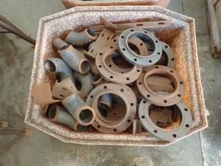 Assortment Of Metal Bends And Flanges