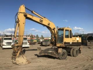 1994 CAT 214 B/FT Mobile Hydraulic Excavator, Q/A 36" Bucket, Cab, 10.00x20 Tires, Showing 10,521 HRS. S/N 9MF00513. Unit 73
