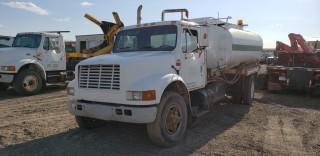 1993 International 4900 S/A Water Truck, c/w DT466, Standard Transmission, Tank w/ Monarch Pump, Hose And Reel, Showing 867,318 KMS. VIN# 1HTSDPCP1PH473306. Unit 5 **Missing Passenger Seat**