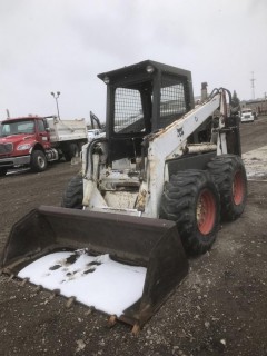 1980 Bobcat 975, C/W Bucket, Aux hyds, Cab, Rear Out Riggers, 15-19.5 Tires, Showing 1638 Hrs. S/N 4963M12413. *NOTE: NO DOOR*