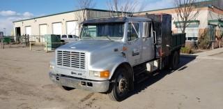 1997 International 4700 S/A Crew Cab Deck Truck, c/w DT 466E Engine, 6 Speed, /w 8' Deck With Sides, Cabinets And Cage, Showing 574,409 KMS, 14,252 HRS. VIN # 1HTSCAAM6VH428108