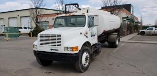 1997 International 4700 S/A Water Truck, c/w DT 466 Engine, Auto Transmission, Tank w/ Pump, Hose And Reel, Showing 336,932 KMS, 16,065 HRS. VIN# 1HTSCAAP9VH436522. Unit 12