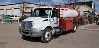 2004 International 4300 S/A Water Truck, c/w DT 466 Engine, Auto Transmission, Tank w/ Monarch Pump, Hose And Reel. Showing 291,005 KMS. VIN# 1HTMMAAL84H663606. Unit 106