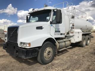 2002 Volvo VHD648 T/A Water Truck, c/w Volvo D12 Diesel, 8 Speed Transmission, 100BBL Tank, Rear Hose Reel And Discharge. VIN# 4V5KC9GH82N317269. Unit 446