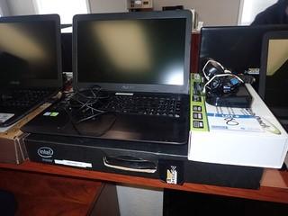 Asus K556U Laptop Computer w/ Powercord and Docking Station. **NOTE: NO HARDDRIVE, LOCATED IN MILK RIVER**