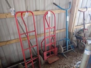 Lot of Barrel Dolly and (2) 2-Wheel Hand Trucks. **LOCATED IN MILK RIVER**
