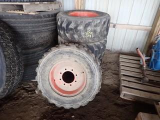Lot of 4 Bobcat 12-15.5 Skid Steer Tires on Rims. **LOCATED IN MILK RIVER**