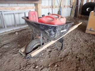 Lot of True Temper Wheelbarrow and Jerry Cans. **LOCATED IN MILK RIVER**