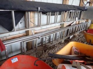 Lot of 2 Aluminum Extension Ladders. **LOCATED IN MILK RIVER**