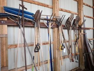 Lot of Asst. Brooms, Rakes and Shovels. **LOCATED IN MILK RIVER**