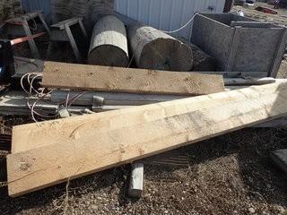 Lot of (3) 10"x3" Planks and 3 Logs. **LOCATED IN MILK RIVER**
