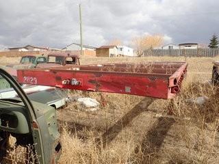 Tandem Axle Highboy Trailer w/ Steel Dayton Wheels- NO DECK. NVSN. **LOCATED IN MILK RIVER**