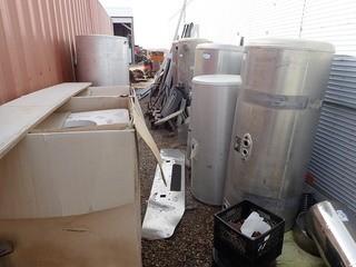 Lot of 9 Asst. Saddle Tanks, Saddle Box, Stack Cover, Air Filter Canister, Trailer Jack, etc. **LOCATED IN MILK RIVER**