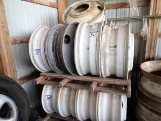Lot of 17 Steel Budd Wheels- 9 USED- 8 NEW AND UNUSED. **LOCATED IN MILK RIVER**
