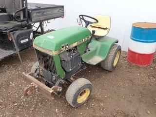 John Deere 317 Utility Tractor. Plumbed, 16x6.50-8 Front Tires and 23x10.50-12 Rear Tires. **REQUIRES NEW BATTERY- LOCATED IN MILK RIVER**