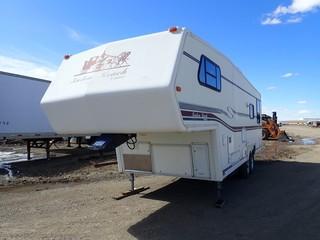 1997 Kustom Koach Legacy 26' Fifth-Wheel Hitch Travel Trailer. Sleeps 6, Stove, Refrigerator, Microwave, 3pc Bath, Awning, Rooftop AC. VIN 2TTLW2603VR970053. **LOCATED IN MILK RIVER**