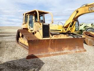1994 Caterpillar D5HLGP Crawler Dozer. Caterpillar 3304 Diesel Engine, 32" Single Grouser Pads w/ Cleats, 6-Way Blade, Hydraulic Winch, Showing 16,912hrs. SN 1DD06080. **LOCATED IN MILK RIVER**