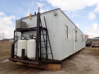 Antelop Home 14TP Accomodation/Office Unit on 13'x56' Triple Beam Skid. Kelvinator LPG Furnace, Nortiz Hot Water Heater, Fresh Water Holding w/Gundfos Pump, (2) 300lbs LPG Pigs, Central Vacuum System, Ensuite w/ Toilet and Sink, (2) 3pc Baths, Kenmore Stacking Washer/Dryer, Stove, Microwave, Flatscreen Television, Leather Furniture. SN 07-004. **LOCATED IN MILK RIVER**