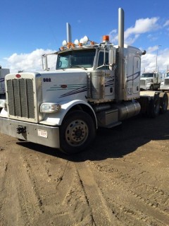 2014 Peterbilt 388 Tandem Axle Truck Tractor. Paccar MX 485hp Diesel Engine, 18-Speed Transmission, 13,221lbs Front Axle, 40,000lbs Rear Axles, 246" W/B, Air Ride Suspension, 48" Flat Top Sleeper, Sliding Fifth-Wheel, Wet Kit, Engine Heater, Double Lockups, Showing 562,023kms and 10,519hrs, CVIP Expires 07/19. VIN 1XPWDP9X3ED230816. **NEW PHOTOS COMING SOON- LOCATED IN SEXSMITH**