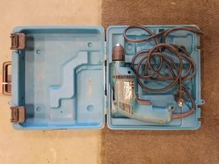 Makita 6480K Electric Drill. ** LOCATED IN SEXSMITH**