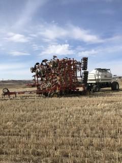 2002 Bourgault 5710-54 Air Drill 54' C/W 10" Spacing, Sgl Shoot, Mid-Row Banding, 3.5" Steel Packers, 5350 350 Bushels 3 Comp't Tow Behind Tank S/N 37132AS07, Variable Rate Control, Dbl Fan, 8" Load Auger, U/C 50%. LOCATED IN CONSORT, AB