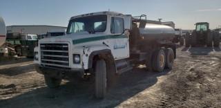1979 IHC 1954 T/A Water Truck, 6 Cyl Diesel, A/T, Tank, Showing 186,486 KMS. S/N AF195JCA23724. NOTE: NO PUMP