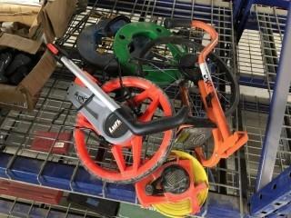 Lot of Fish Tape 100', Measuring Tape 165' and Digital Distance Measuring Wheel.